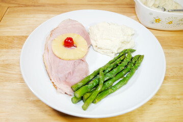 Delicious Ham Dinner	with Mashed Potatoes and Fresh Steamed Asparagus