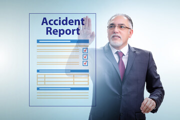 Businessman pressing buttons on virtual accident report