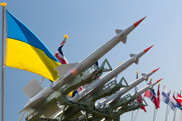 Flags of Ukraine, Russia and NATO and European Union countries. International relations and...
