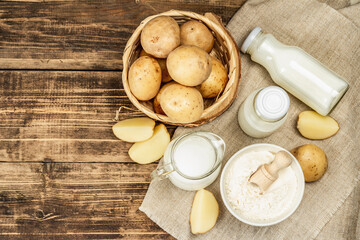 Obraz na płótnie Canvas Alternative potato milk, trendy non-dairy drink. Lactose free vegan plant beverage
