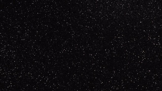 beautiful festive shiny video with shimmering black sequins. black glitter paper texture 