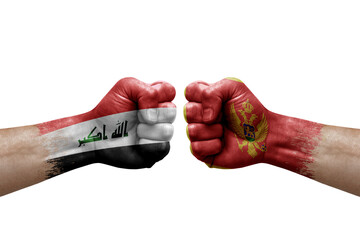 Two hands punch to each others on white background. Country flags painted fists, conflict crisis concept between iran and montenegro