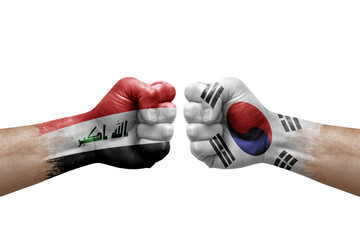 Two hands punch to each others on white background. Country flags painted fists, conflict crisis concept between iran and south korea