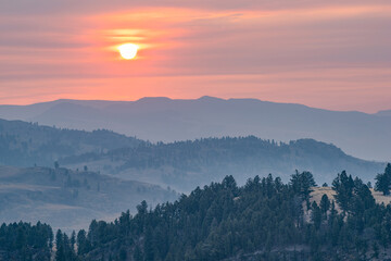 Wildfire haze at sunrise, Yellowstone National Park, Wyoming