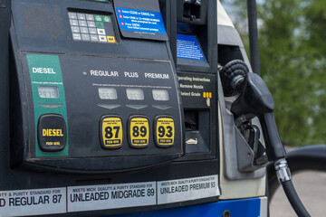 A USA petrol pump shows the rising prices of fuel and the choices of octane available
