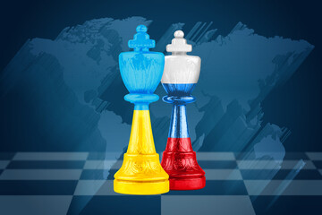 Concept of war between Ukraine and Russia. Chess pieces in color of national flags on board against...
