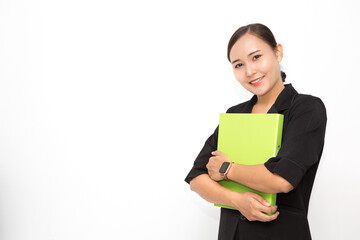 Beautiful Asian business woman wearing black suit holding document folder smiling on  white background and copy space. Confident Asian working woman smiling and cheerful