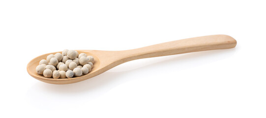 Peppercorn in wood spoon isolated on white