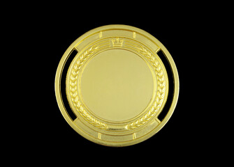 Gold medal isolated on black background