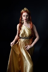  Full length portrait of pretty female model wearing  grecian goddess  toga gown, posing with...