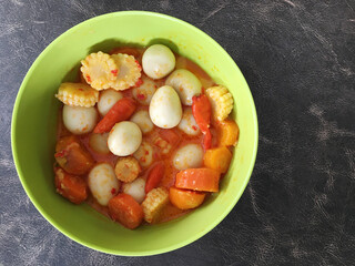 Orem-orem is a typical Javanese culinary from Malang, Indonesia which is made from carrot, corn, eggs and cooked in thick coconut milk.
