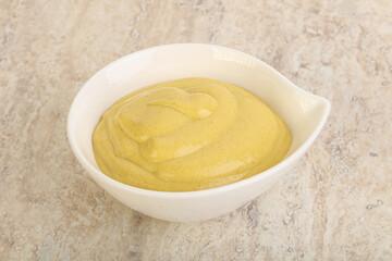 Organic mustard sauce in the bowl