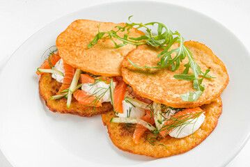 potato pancakes with salmon and cream cheese