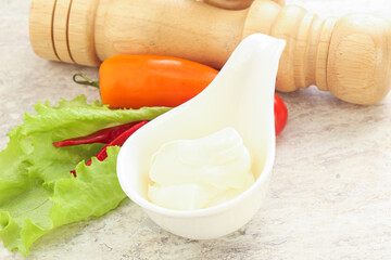 Organic mayonnaise sauce in the bowl