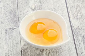 Chicken egg in the bowl