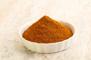 Dry Paprika powder in the bowl