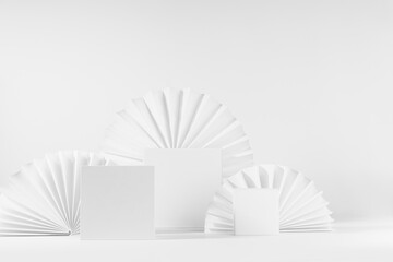 Fashion minimal modern asian style scene with set of three different size square podiums mockup as showcase for displaying, presentation cosmetic product, goods with ribbed paper fans as decor.
