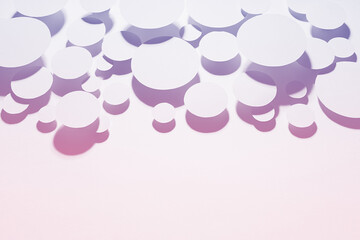 Delicate motion swarm pattern of soar light gradient purple and pink ovals in shining light with soft strict shadows, top view, border, copy space. Sensitive active energy cute abstract background.