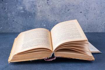 open book on dark background with copy space
