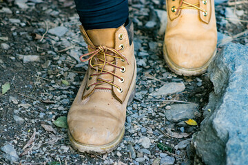 boots walking through the paths of italy at national park of Cinque Terre, 