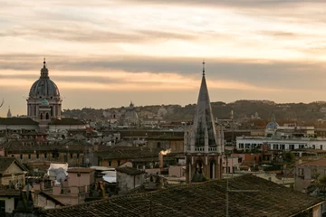 Deurstickers Panoramic view from the Pinicio viewpoint of Rome Italy, in the middle of an intense orange sunset © CesarBayona