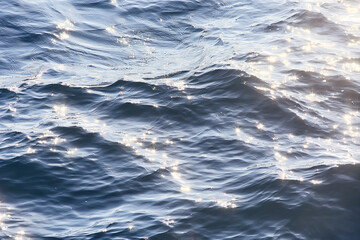 summer sun sea texture glare on the water, abstract ocean aqua background