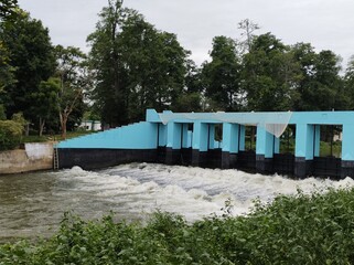 WATER FLOWING FROM A DAM