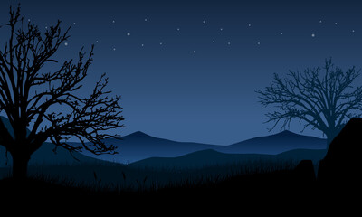 Fantastic mountain view with dry tree silhouette of village at night
