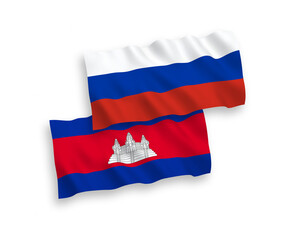 National vector fabric wave flags of Kingdom of Cambodia and Russia isolated on white background. 1 to 2 proportion.