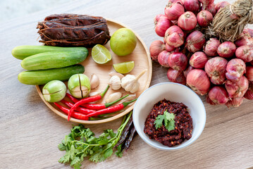 Delicious Thai chili paste including raw materials for making chili paste and vegetables