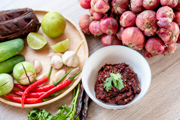 Delicious Thai chili paste including raw materials for making chili paste and vegetables