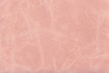 薄いピンク色のシワのある革