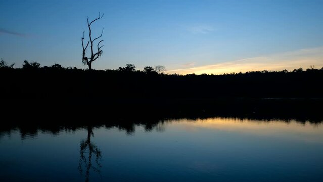 Beautiful dawn scenic sunrise in the morning with a reflection on the lake 4K ProRes UHQ Timelapse
