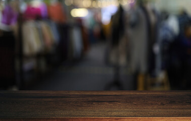 Empty wooden table in front of abstract blurred background of coffee shop . can be used for display or montage your products.Mock up for display of product