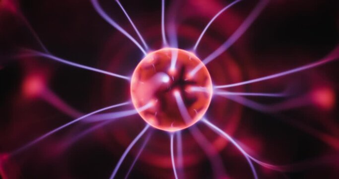 Tesla coil inside glass sphere closeup