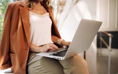 Fototapeta premium girl working on a laptop remotely or in the office