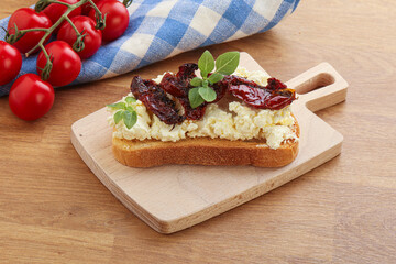 Bruschetta with soft cheese and tomato
