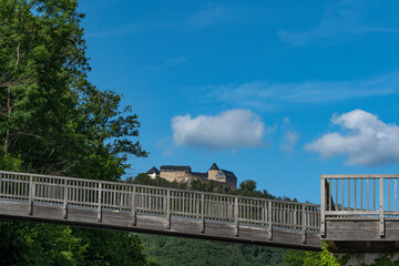 Waldeck Castle, a medieval castle complex with a wooden bridge in the foreground