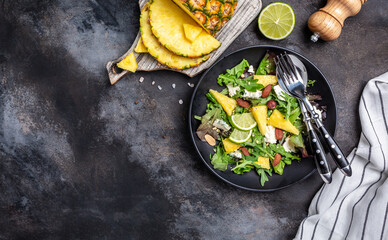 Diet menu. Healthy salad of fresh pineapple, blue cheese and almond. Vegan food. Long banner format, top view