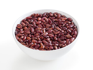Red pinto beans in white bowl isolated on white background with clipping path