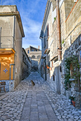 A narrow street among the old stone houses of the oldest district of the city of Caserta.