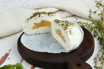 Delicate balls of cheese of cow's milk with filling of sweet figs