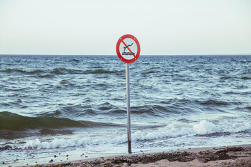 Sign prohibiting swimming in the North Sea in Denmark