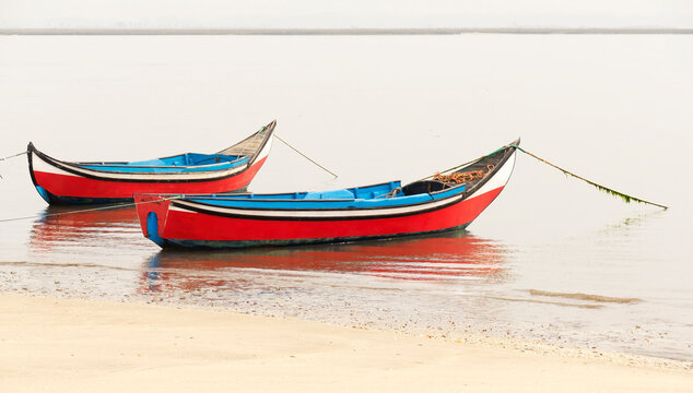 Two colorful fishing boats inRia de Aveiro