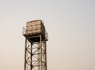 A water tank tower in the city