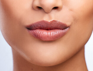 Going against the average. Cropped shot of an unrecognizable womans beautiful full lips.