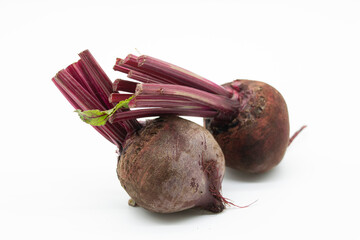 Fresh red beets or beetroots isolated on white background
