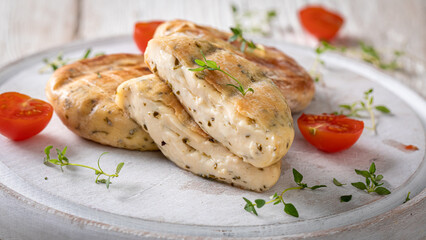 Delicious grilled halloumi cheese seasoned with herbs and pepper.