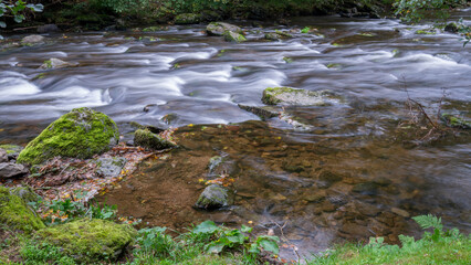 View of fast flowing water in the East Lyn River