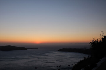 Panoramic and colourful sunset of the Aegean Sea in Santorini Greece